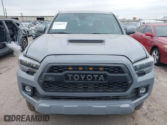 2021 Toyota Tacoma 4WD SR5 with VIN 3TMDZ5BN5MM116584, listed as a IAAI auction lot 41548175 with 23,031 mi miles. Bid and sale history available at carsss.com. Image 12.