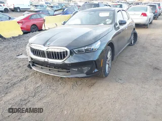2024 BMW 5 Series 540i xDrive with VIN WBA63FJ08RCS79869, listed as a IAAI auction lot 40786364 with 4,900 mi miles. Bid and sale history available at carsss.com. Image 21.