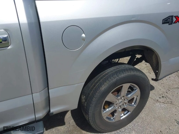 2018 Ford F-150 XL with VIN 1FTEW1EG2JFE36699, listed as a IAAI auction lot 41842524 with 152,813 mi miles. Bid and sale history available at carsss.com. Image 6.
