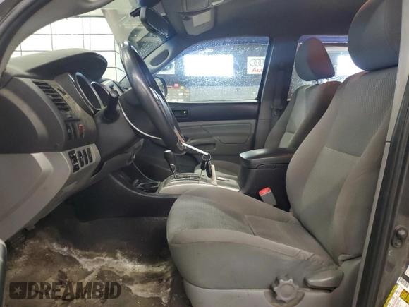2013 Toyota Tacoma with VIN 3TMLU4ENXDM129430, listed as a Copart auction lot 55740185 with 213,054 mi miles and Clean Title. Bid and sale history available at DreamBid. Image 7.