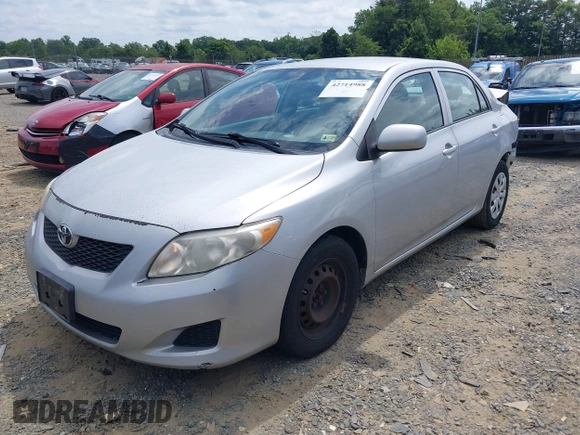 2009 Toyota Corolla with VIN 1NXBU40E89Z128911, listed as a IAAI auction lot 42714988 with 215,416 mi miles and . Bid and sale history available at DreamBid. Image 2.