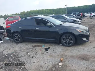 2014 Kia Optima LX z VIN 5XXGM4A72EG337457, wystawiony jako IAAI lot #42486150 z przebiegiem 135 338 mil mil oraz . Historia ofert i sprzedaży dostępna na DreamBid. Obrazek 13.