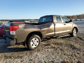 2010 Toyota Tundra 4WD Truck SR with VIN 5TFCW5F14AX010600, listed as a Copart auction lot 77141614 with 138,781 mi miles and Salvage Title. Bid and sale history available at carsss.com. Image 3.