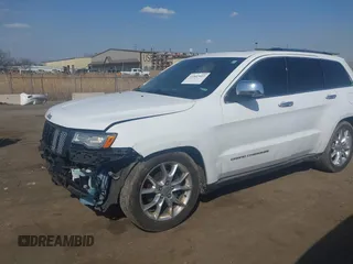 2015 Jeep Grand Cherokee Summit with VIN 1C4RJFJGXFC734025, listed as a IAAI auction lot 41842927 with 137,993 mi miles. Bid and sale history available at carsss.com. Image 17.