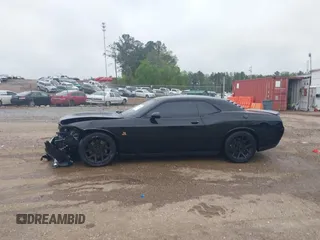 2016 Dodge Challenger R/T Scat Pack z VIN 2C3CDZFJ4GH118973, wystawiony jako IAAI lot #41960654 z przebiegiem 180 315 mil mil oraz . Historia ofert i sprzedaży dostępna na DreamBid. Obrazek 14.