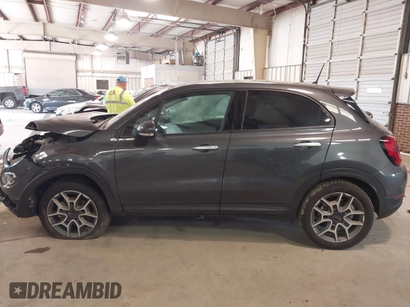 2021 FIAT 500X Trekking with VIN ZFBNF3B17MP909591, listed as a IAAI auction lot 41256551 with 58,688 mi miles and . Bid and sale history available at DreamBid. Image 14.