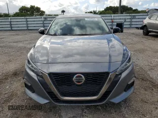 2022 Nissan Altima 2.0 SR with VIN 1N4AL4CV3NN310654, listed as a Copart auction lot 77949304 with 69,558 mi miles and Salvage Title. Bid and sale history available at carsss.com. Image 5.