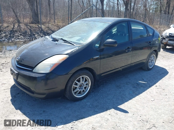 2006 Toyota Prius with VIN JTDKB20U067534309, listed as a IAAI auction lot 42062045 with 149,697 mi miles. Bid and sale history available at carsss.com. Image 2.