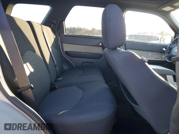 2009 Mercury Mariner with VIN 4M2CU81G99KJ02338, listed as a Copart auction lot 88337675 with 82,115 mi miles and Salvage title. Bid and sale history available at DreamBid. Image 11.