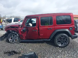 2021 Jeep Wrangler Unlimited Willys with VIN 1C4HJXDN8MW714976, listed as a IAAI auction lot 42080856 with 74,613 mi miles and . Bid and sale history available at DreamBid. Image 15.