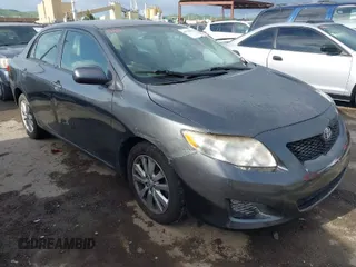 2009 Toyota Corolla with VIN 1NXBU40E79Z042778, listed as a IAAI auction lot 41928062 with 201,409 mi miles. Bid and sale history available at carsss.com. Image 1.