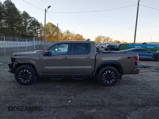 2022 Nissan Frontier SV z VIN 1N6ED1EJ3NN648912, wystawiony jako IAAI lot #40888927 z przebiegiem 59 633 mil mil oraz . Historia ofert i sprzedaży dostępna na DreamBid. Obrazek 15.