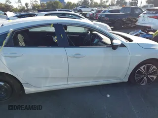 2017 Honda Civic EX-T with VIN 19XFC1E38HE002205, listed as a IAAI auction lot 40891678 with 10,398 mi miles and . Bid and sale history available at DreamBid. Image 13.