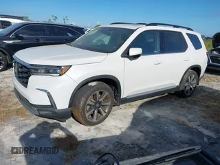 2024 Honda Pilot Elite with VIN 5FNYG1H81RB025163, listed as a IAAI auction lot 40502507 with 9,867 mi miles. Bid and sale history available at carsss.com. Image 17.