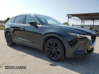 2023 Mazda CX-9 Touring Plus with VIN JM3TCBAY3P0657042, listed as a Copart auction lot 56391575 with 49,780 mi miles and Clean title. Bid and sale history available at DreamBid. Image 4.
