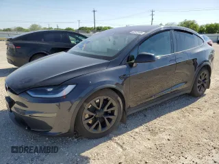 2023 Tesla Model X with VIN 7SAXCDE5XPF422163, listed as a Copart auction lot 52573185 with Not Provided miles and Salvage Title. Bid and sale history available at DreamBid. Image 1.