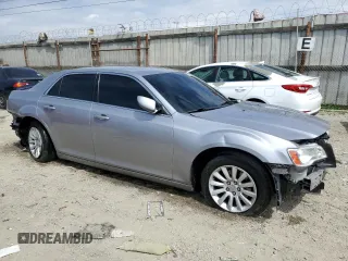 2014 Chrysler 300 with VIN 2C3CCAAG8EH179353, listed as a Copart auction lot 51092575 with 182,809 mi miles and Salvage Title. Bid and sale history available at carsss.com. Image 4.
