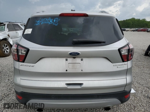 2017 Ford Escape Titanium with VIN 1FMCU0J96HUC12822, listed as a Copart auction lot 54259375 with 127,114 mi miles and Salvage Title. Bid and sale history available at DreamBid. Image 6.
