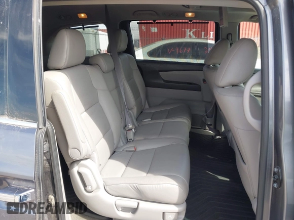2014 Honda Odyssey Touring with VIN 5FNRL5H91EB093540, listed as a IAAI auction lot 41887412 with 202,076 mi miles and . Bid and sale history available at DreamBid. Image 8.