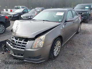 2012 Cadillac CTS with VIN 1G6DA5E50C0152500, listed as a IAAI auction lot 41864677 with 163,594 mi miles and . Bid and sale history available at DreamBid. Image 2.