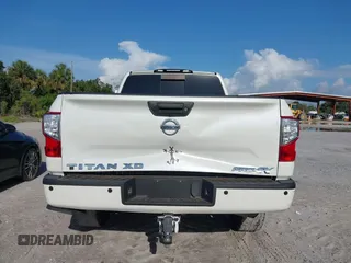 2016 Nissan Titan Platinum Reserve with VIN 1N6BA1F4XGN517905, listed as a IAAI auction lot 42676671 with 110,004 mi miles and . Bid and sale history available at DreamBid. Image 16.