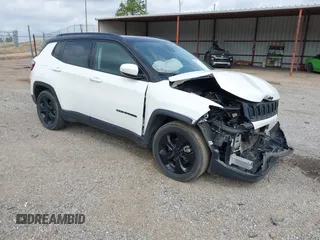 2021 Jeep Compass Latitude with VIN 3C4NJCBB6MT587350, listed as a IAAI auction lot 41769694 with 73,739 mi miles and . Bid and sale history available at DreamBid. Image 1.