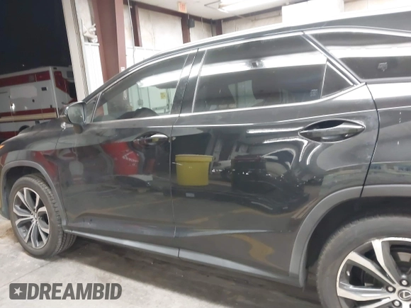 2018 Lexus RX with VIN JTJGZKCA2J2004185, listed as a IAAI auction lot 41773902 with 52,988 mi miles. Bid and sale history available at carsss.com. Image 14.