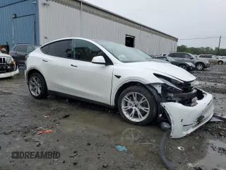 2023 Tesla Model Y Long Range z VIN 7SAYGDEE4PF797653, wystawiony jako Copart lot #58668985 z przebiegiem 35 520 mil mil oraz Szkody całkowita. Historia ofert i sprzedaży dostępna na DreamBid. Obrazek 4.