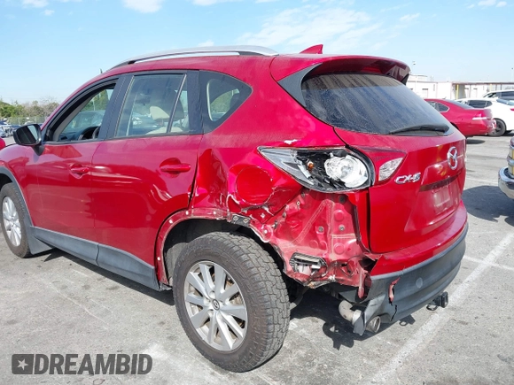 2016 Mazda CX-5 Sport with VIN JM3KE2BY4G0701442, listed as a IAAI auction lot 41682335 with 125,624 mi miles. Bid and sale history available at carsss.com. Image 3.