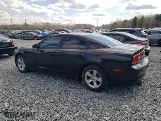 2014 Dodge Charger SE with VIN 2C3CDXBG9EH349301, listed as a Copart auction lot 54000015 with 210,349 mi miles and Clean Title. Bid and sale history available at carsss.com. Image 2.