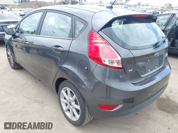 2018 Ford Fiesta SE with VIN 3FADP4EJ7JM127256, listed as a IAAI auction lot 41938121 with 83,211 mi miles. Bid and sale history available at carsss.com. Image 3.