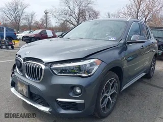 2019 BMW X1 xDrive28i with VIN WBXHT3C51K5L90571, listed as a IAAI auction lot 41909209 with 35,902 mi miles. Bid and sale history available at carsss.com. Image 21.
