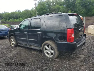 2010 Chevrolet Tahoe LTZ with VIN 1GNUKCE05AR164175, listed as a Copart auction lot 57223295 with 423,010 mi miles and Salvage title. Bid and sale history available at DreamBid. Image 2.
