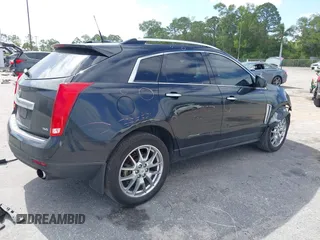 2013 Cadillac SRX Performance Collection z VIN 3GYFNDE39DS543037, wystawiony jako IAAI lot #42162276 z przebiegiem 156 282 mil mil oraz . Historia ofert i sprzedaży dostępna na DreamBid. Obrazek 4.