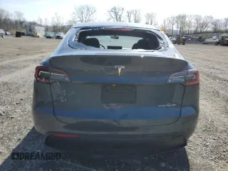 2021 Tesla Model Y Long Range with VIN 5YJYGDEE9MF119974, listed as a Copart auction lot 53794025 with 66,411 mi miles and Salvage Title. Bid and sale history available at DreamBid. Image 6.