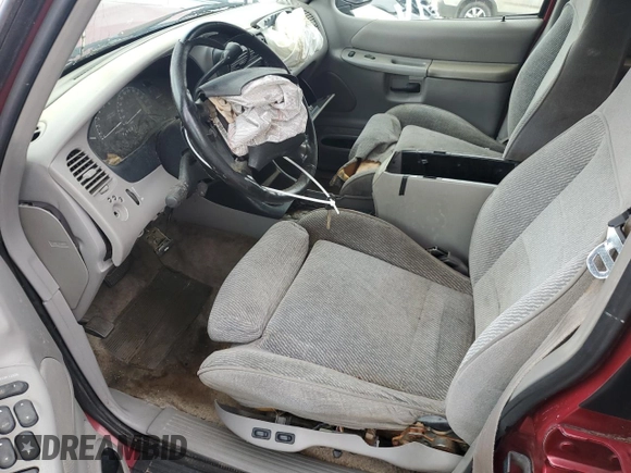 1996 Ford Explorer XL z VIN 1FMDU32X5TUD14799, wystawiony jako Copart lot #54529405 z przebiegiem 195 730 mil mil oraz Szkoda całkowita • Salvage title. Historia ofert i sprzedaży dostępna na DreamBid. Obrazek 7.