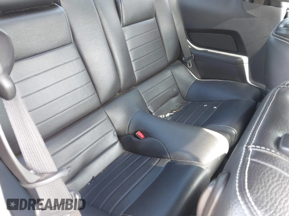 2012 Ford Mustang Premium with VIN 1ZVBP8AM8C5276970, listed as a IAAI auction lot 41195671 with 88,420 mi miles and . Bid and sale history available at DreamBid. Image 8.