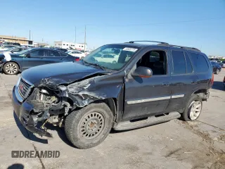 2003 GMC Envoy SLT z VIN 1GKDS13S332281271, wystawiony jako Copart lot #53685775 z przebiegiem 236 997 mil mil oraz Szkody całkowita. Historia ofert i sprzedaży dostępna na DreamBid. Obrazek 1.