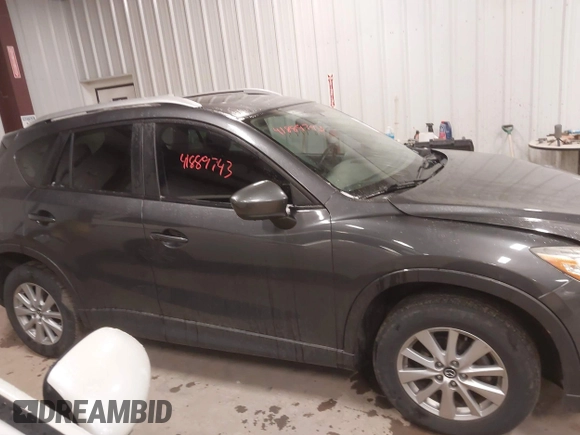 2015 Mazda CX-5 Touring with VIN JM3KE4CY3F0460501, listed as a IAAI auction lot 41889743 with 160,367 mi miles. Bid and sale history available at carsss.com. Image 13.