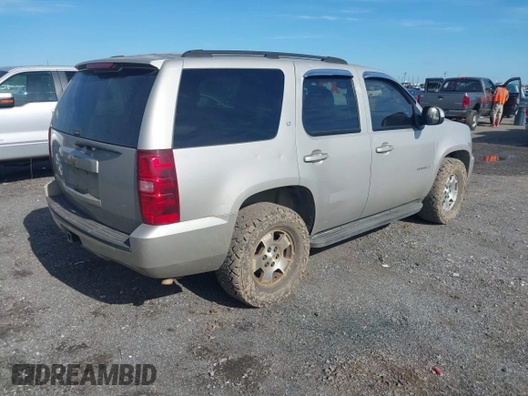 2007 Chevrolet Tahoe LT with VIN 1GNFK13087R165703, listed as a IAAI auction lot 42370222 with 150,014 mi miles and . Bid and sale history available at DreamBid. Image 4.