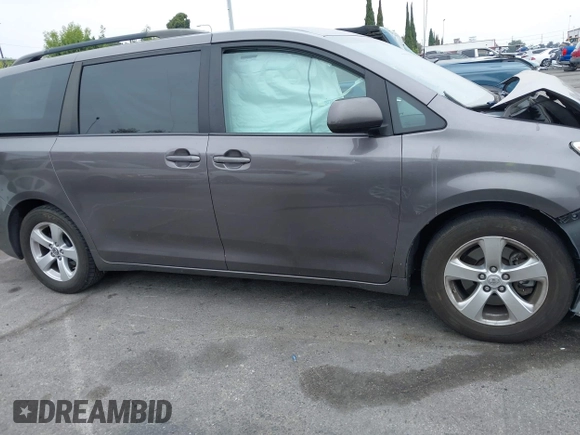 2015 Toyota Sienna LE AAS with VIN 5TDKK3DC5FS606862, listed as a IAAI auction lot 42464119 with 158,135 mi miles and . Bid and sale history available at DreamBid. Image 13.