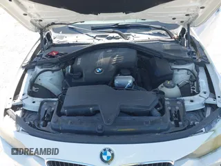 2014 BMW 3 Series 320i with VIN WBA3B1G53ENT00444, listed as a IAAI auction lot 42082984 with 94,401 mi miles. Bid and sale history available at carsss.com. Image 10.