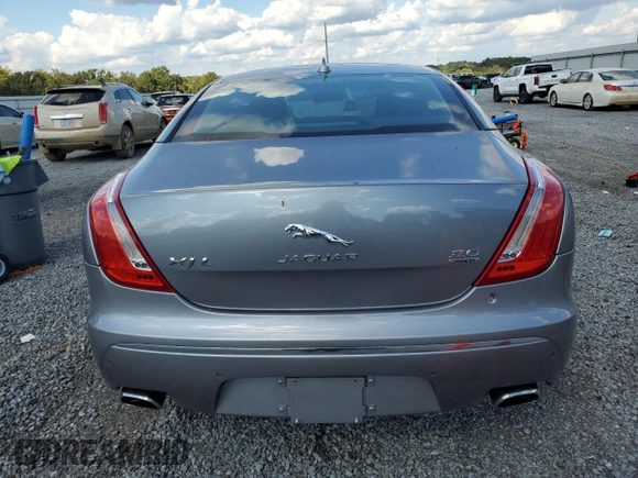2015 Jaguar XJ Portfolio with VIN SAJWJ2GD2F8V75238, listed as a Copart auction lot 73633984 with 102,545 mi miles and Salvage title. Bid and sale history available at DreamBid. Image 6.