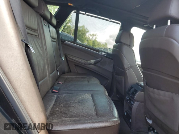 2012 BMW X5 35i with VIN 5UXZV4C54CL744502, listed as a Copart auction lot 57828115 with 161,597 mi miles and Clean title. Bid and sale history available at DreamBid. Image 11.