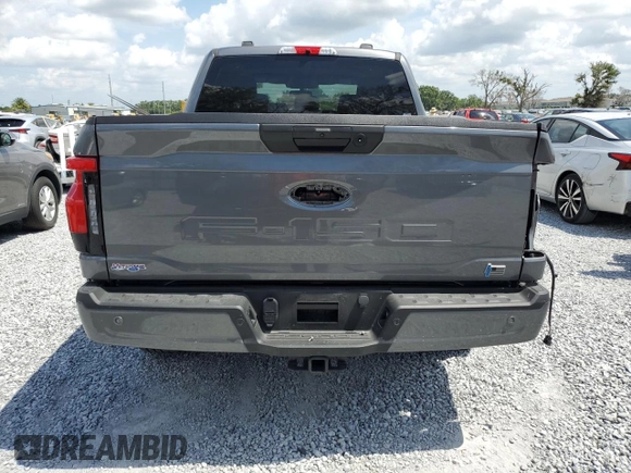 2024 Ford F-150 Lightning XLT with VIN 1FTVW3LK8RWG23783, listed as a Copart auction lot 58359625 with 5,864 mi miles and Salvage title. Bid and sale history available at DreamBid. Image 6.