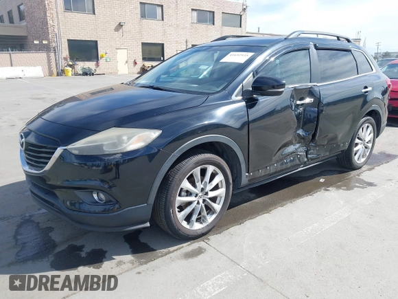2015 Mazda CX-9 Grand Touring z VIN JM3TB2DA4F0450014, wystawiony jako IAAI lot #41692935 z przebiegiem 90 800 mil mil oraz . Historia ofert i sprzedaży dostępna na DreamBid. Obrazek 17.