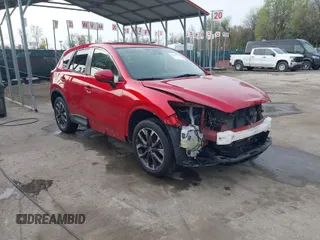 2016 Mazda CX-5 Grand Touring with VIN JM3KE4DY9G0865780, listed as a IAAI auction lot 41913914 with 76,579 mi miles. Bid and sale history available at carsss.com. Image 1.