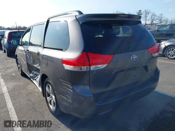 2014 Toyota Sienna LE AAS with VIN 5TDKK3DC5ES483532, listed as a IAAI auction lot 41905911 with 122,392 mi miles and . Bid and sale history available at DreamBid. Image 3.