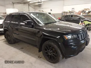 2018 Jeep Grand Cherokee Laredo with VIN 1C4RJFAG0JC466739, listed as a IAAI auction lot 41974220 with 107,996 mi miles and . Bid and sale history available at DreamBid. Image 1.