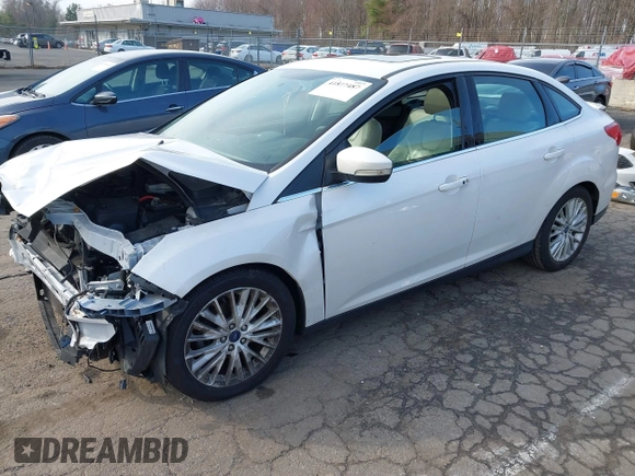 2018 Ford Focus Titanium z VIN 1FADP3J25JL293835, wystawiony jako IAAI lot #41877487 z przebiegiem 109 211 mil mil oraz . Historia ofert i sprzedaży dostępna na DreamBid. Obrazek 4.